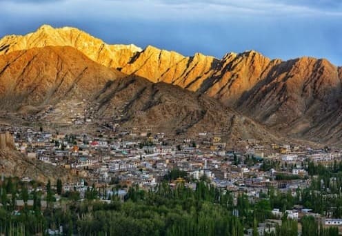 Leh city with monasteries and mountains, one of the most cultural places to visit in Ladakh.