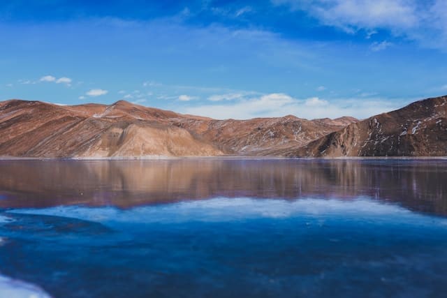 Pangong Lake with crystal-clear blue waters, among the most beautiful places to visit in Ladakh.