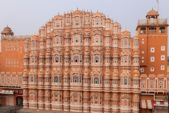 Intricate windows of Hawa Mahal showcasing the best places to visit in Jaipur India.