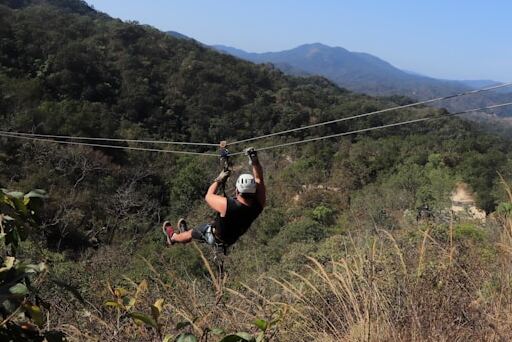 Ziplining across scenic valleys in Manali, one of the thrilling places to visit in Manali Himachal Pradesh.