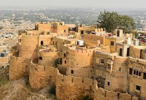 Golden Jaisalmer Fort rising above the city, one of the most iconic tourist places in Jaisalmer.