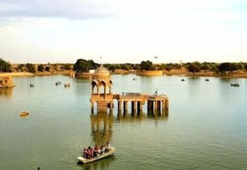 Peaceful Gadisar Lake surrounded by temples, among the scenic tourist places in Jaisalmer.