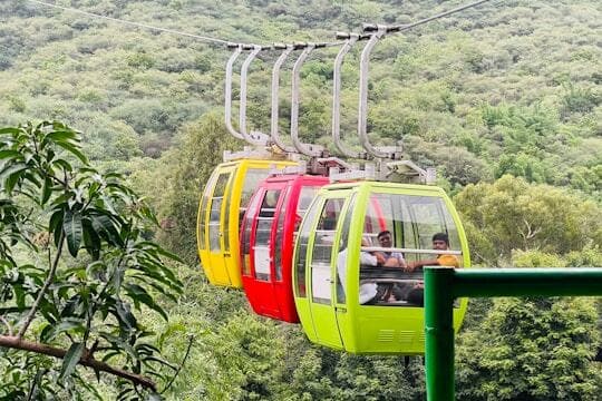 Visitors enjoying the ropeway ride to Karni Mata Temple in Udaipur.